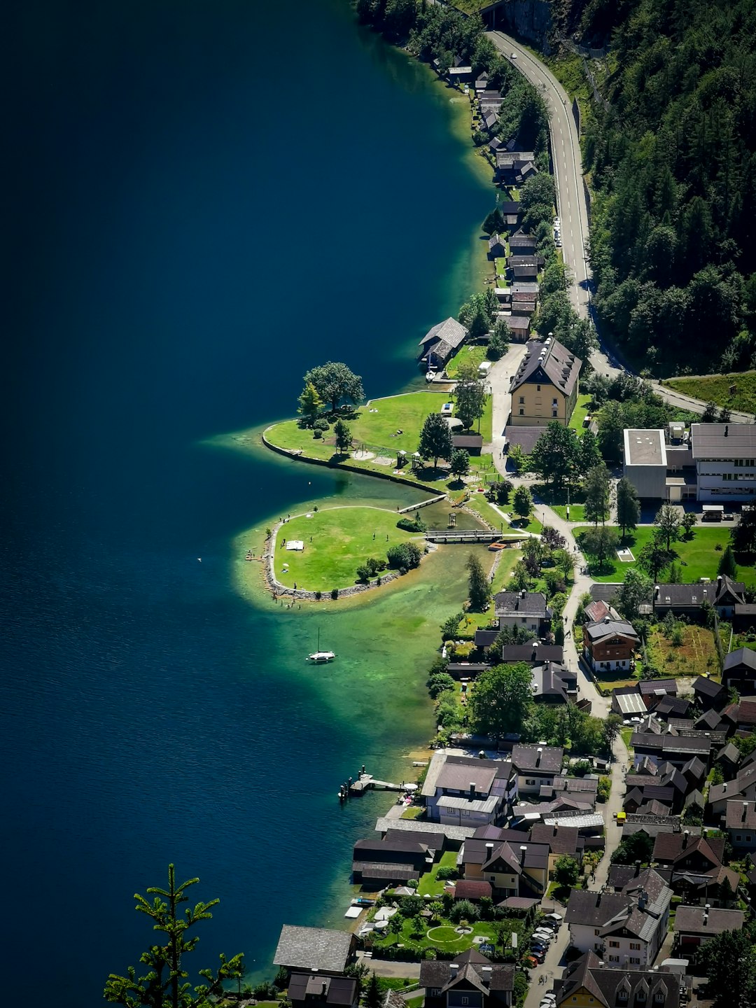 aerial photo of buildings near body of water during daytime