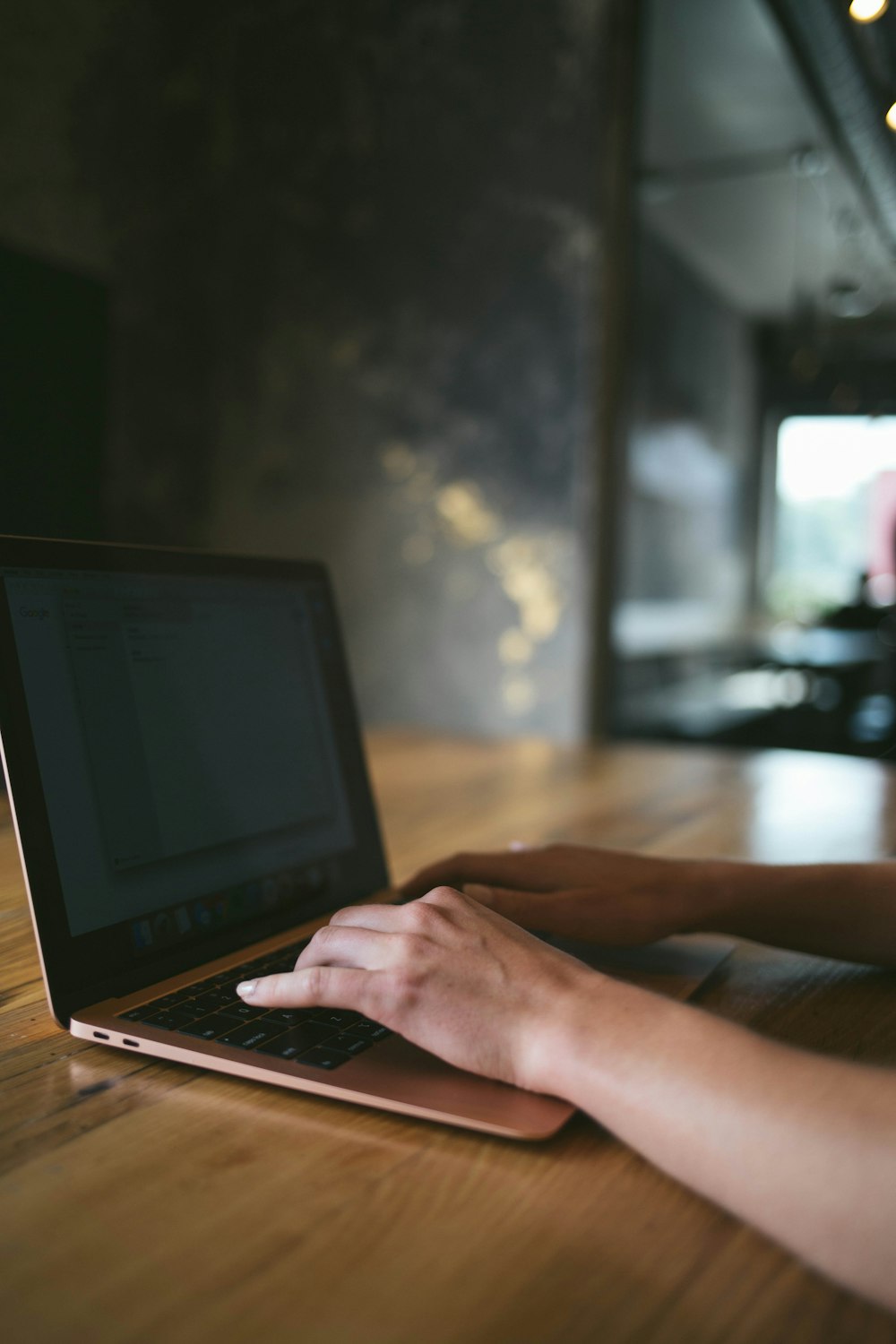 person using laptop computer