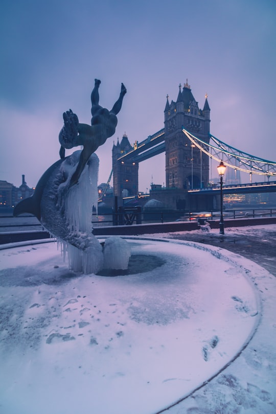 grey water fountain during daytime in Tower Bridge United Kingdom