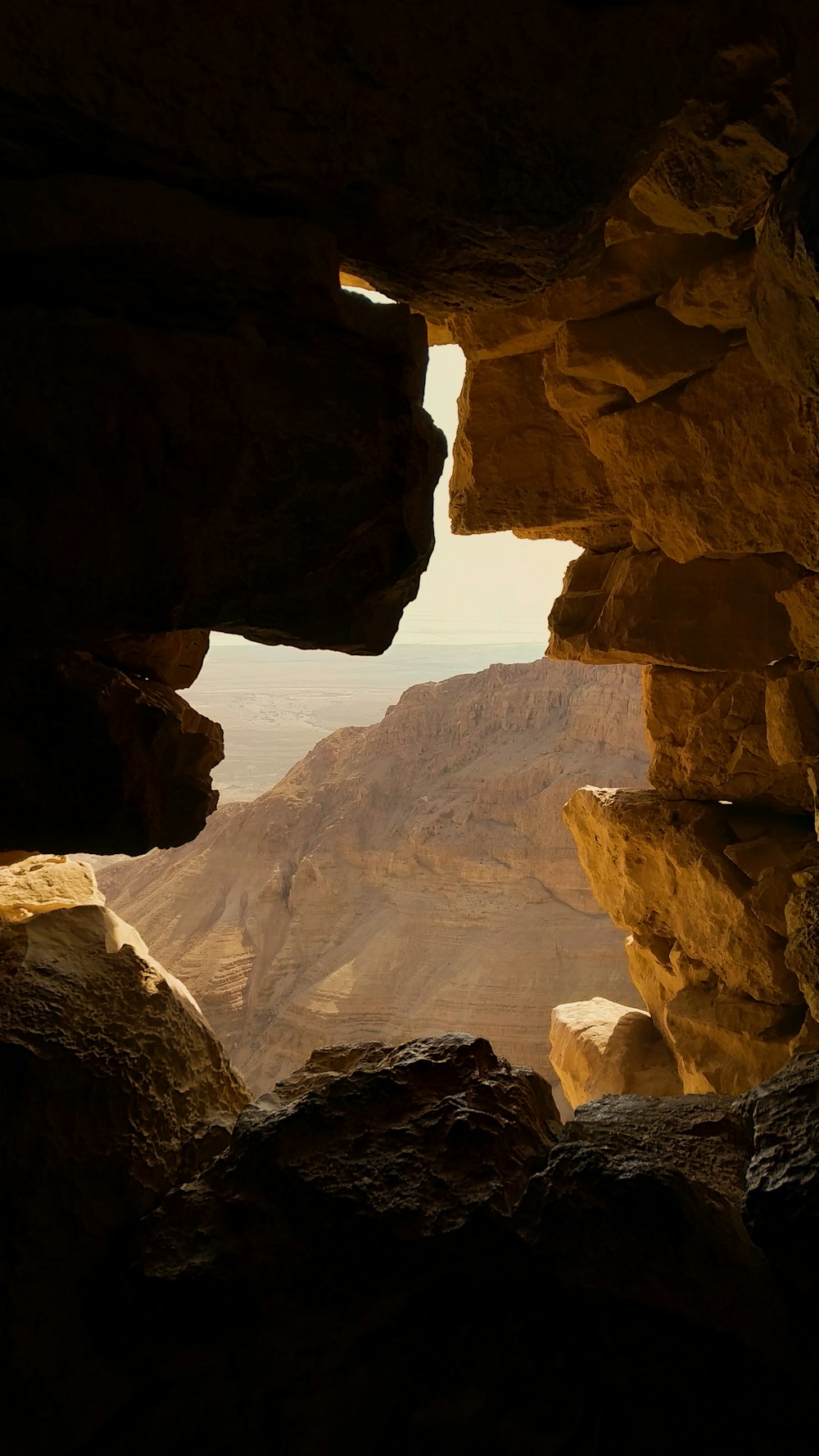 rocky cave during day