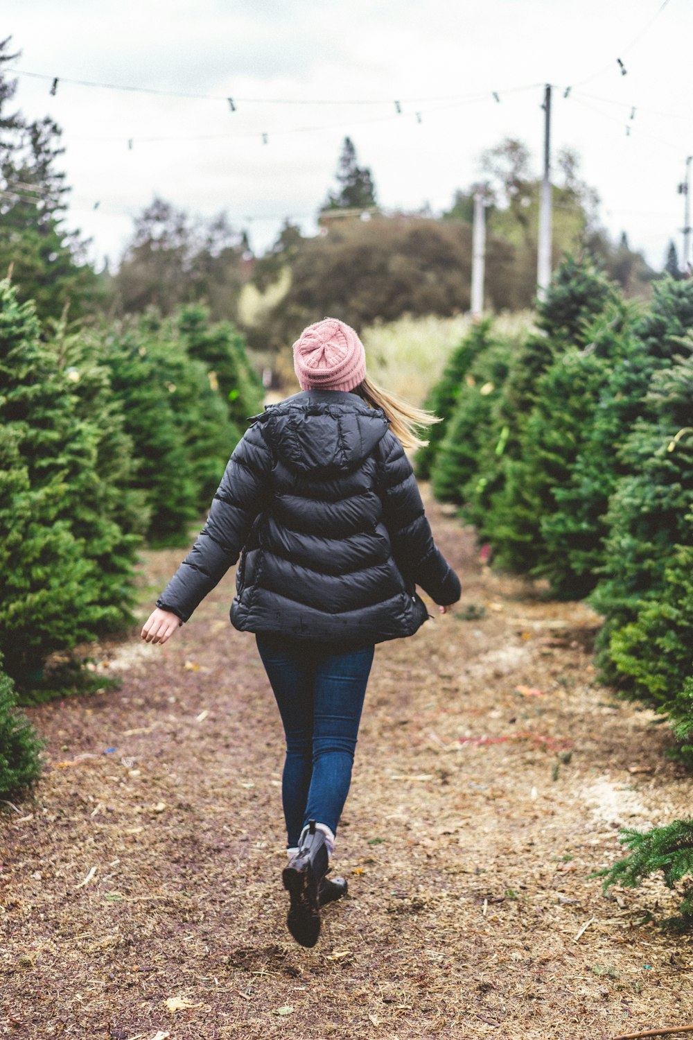 woman wearing black bubble jacket