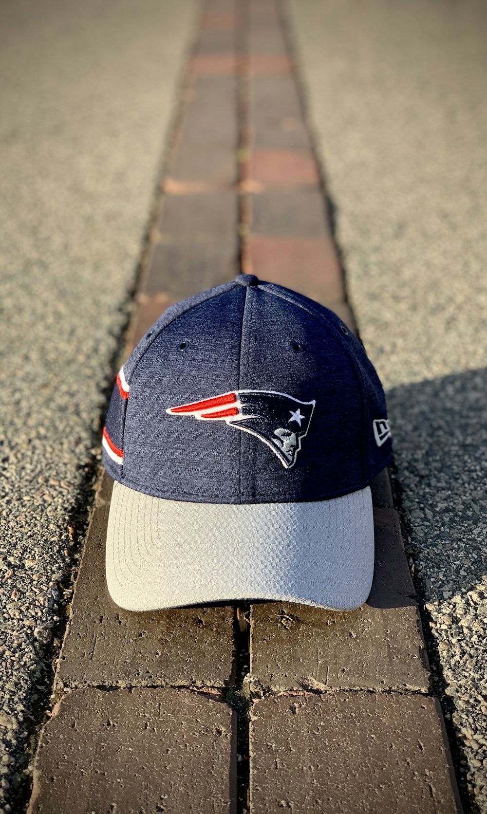 blue and white New Era New England Patriots fitted cap