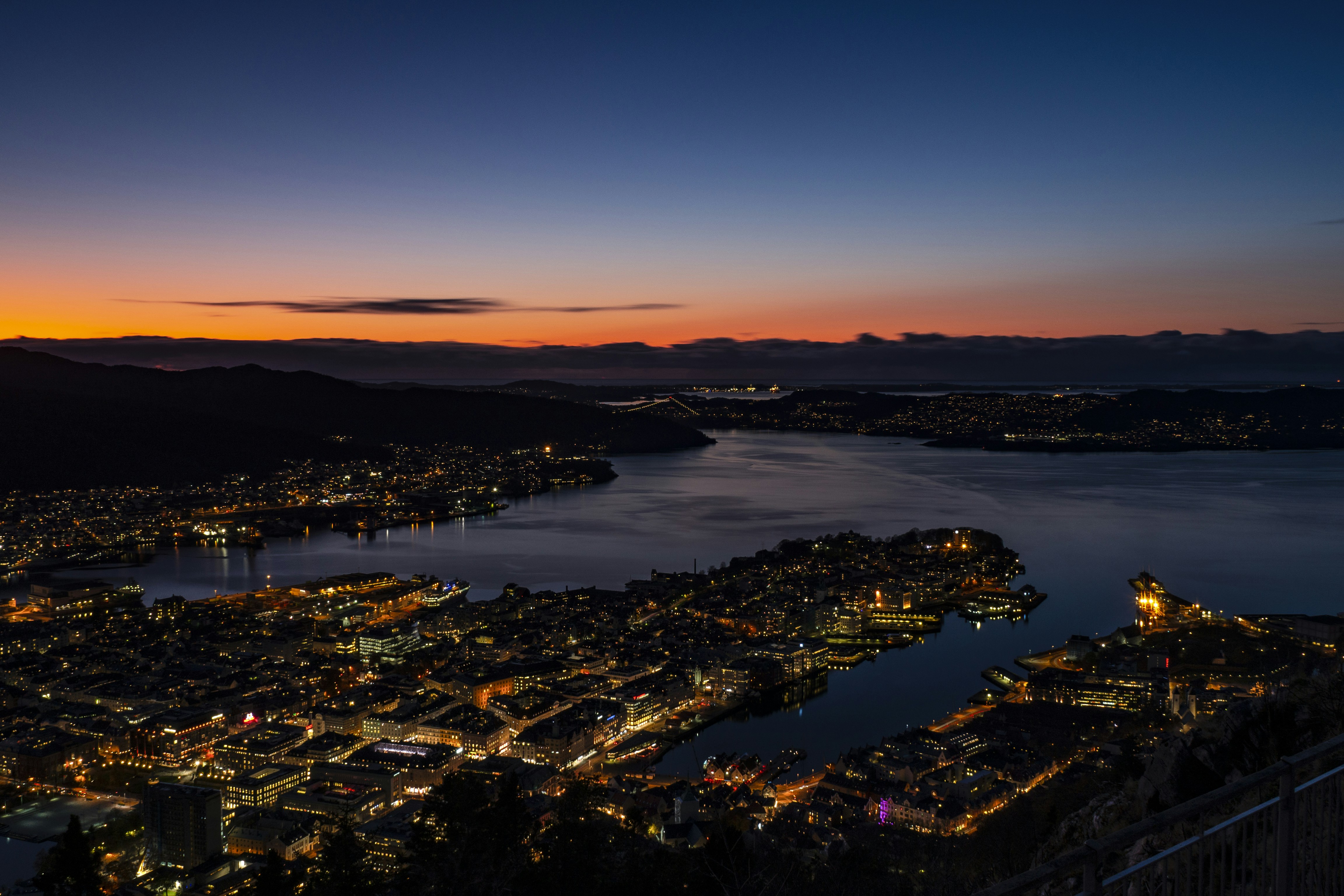 Lofoten, Norway (Reinebringen hike at midnight sun) - Bergen, Norway, during late sunset. View from Mount Fløyen.