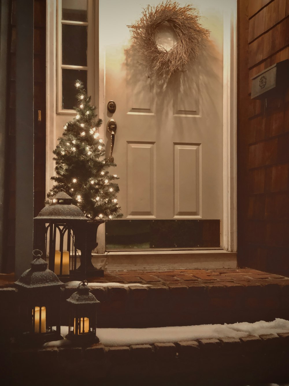 brown wooden table near white wooden door