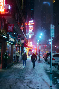 people walking beside building