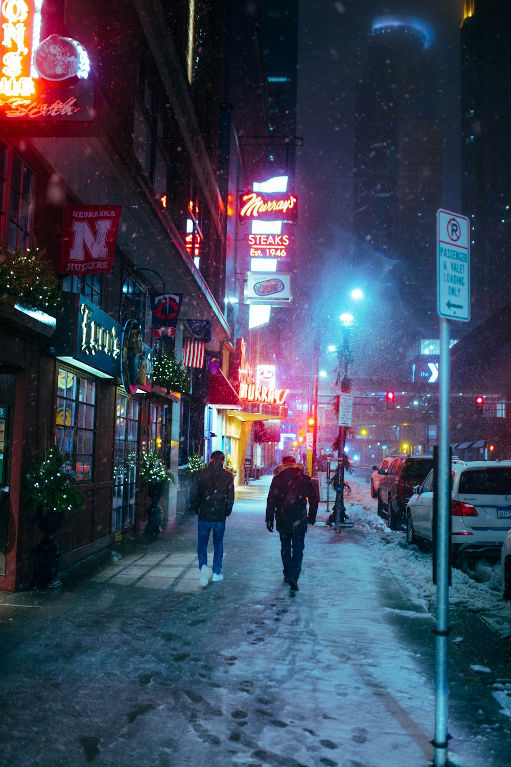 people walking beside building