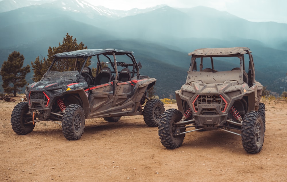 two grey UTV's