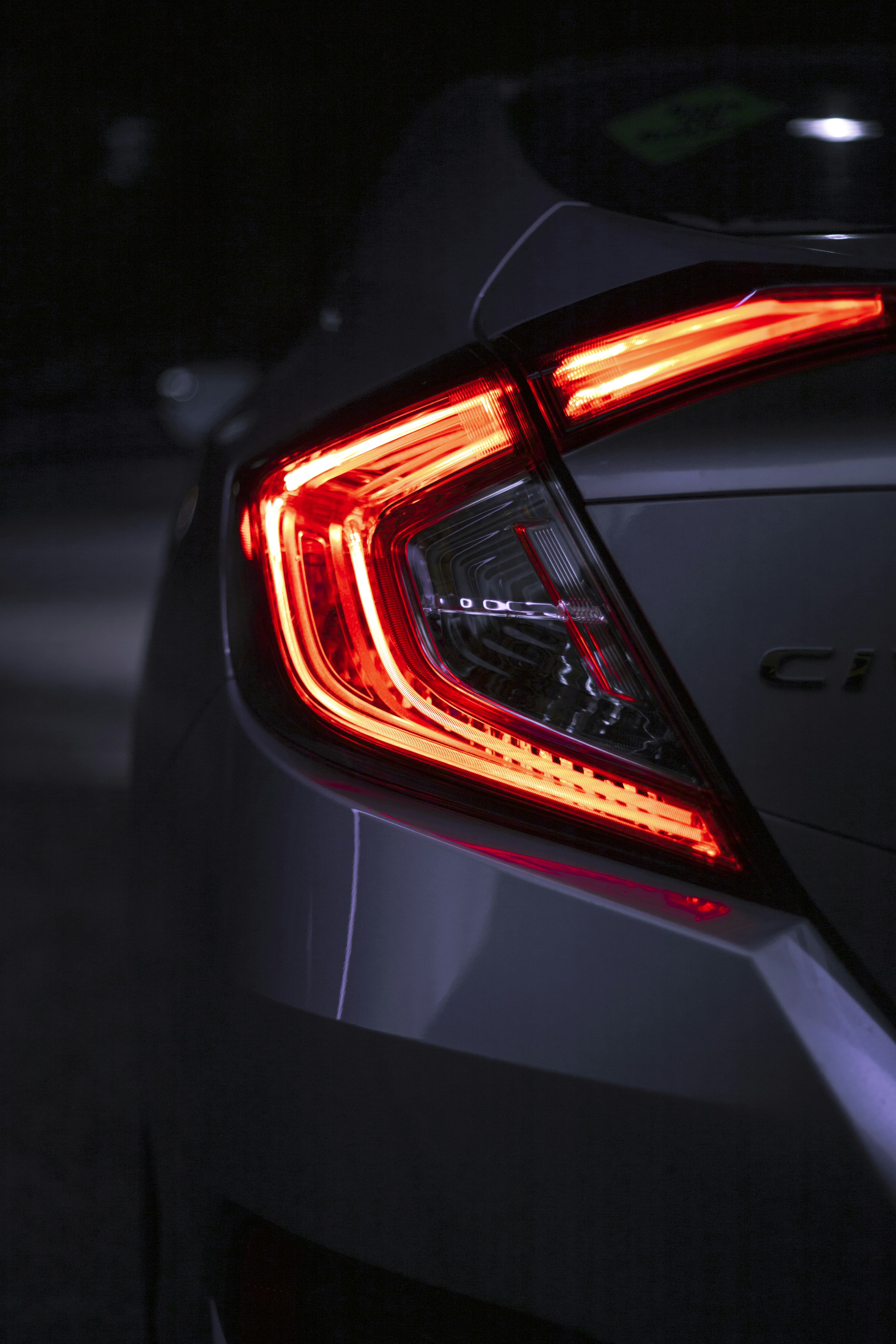 a close up of the tail lights of a car