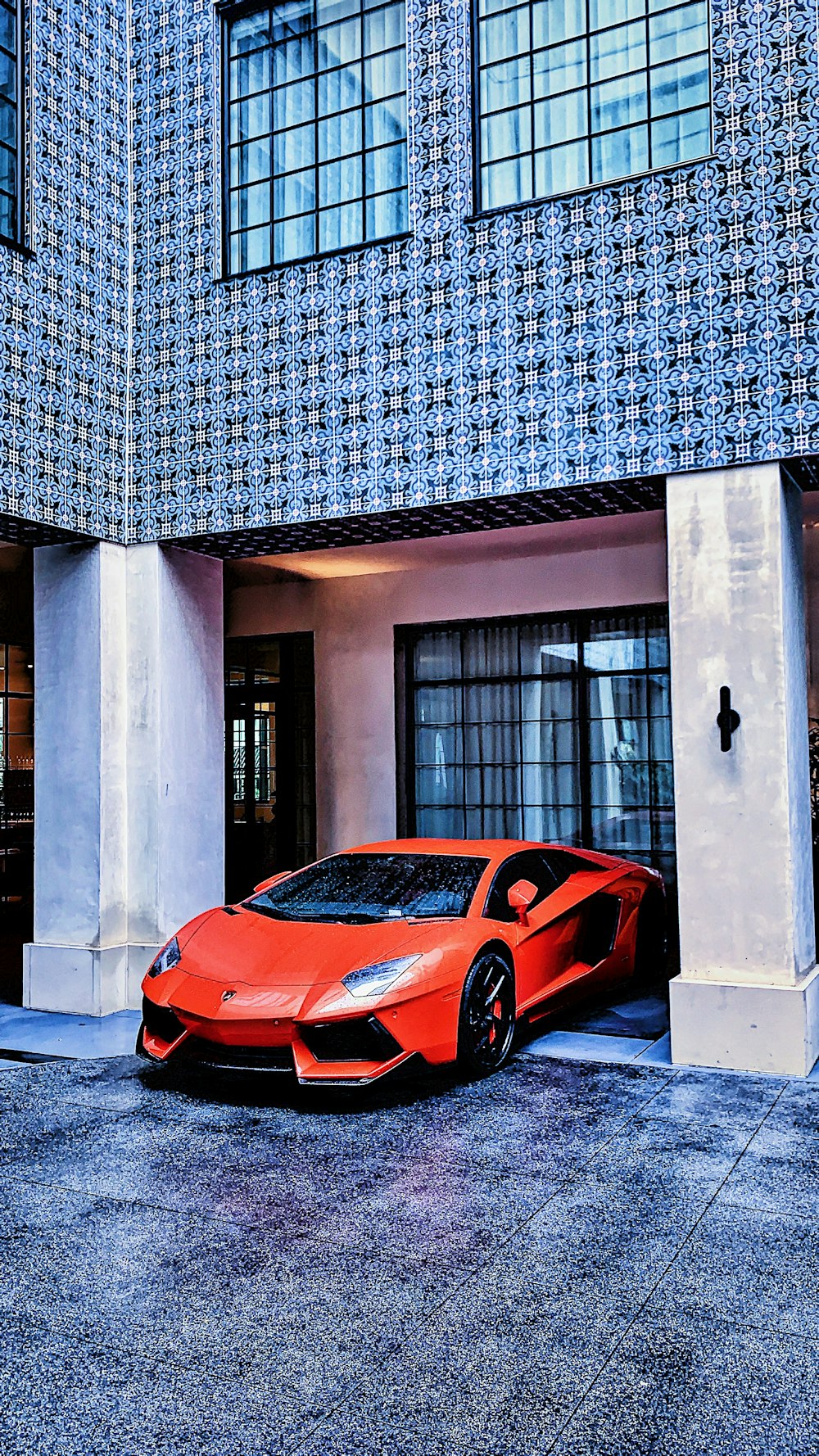 red Lamborghini on parked