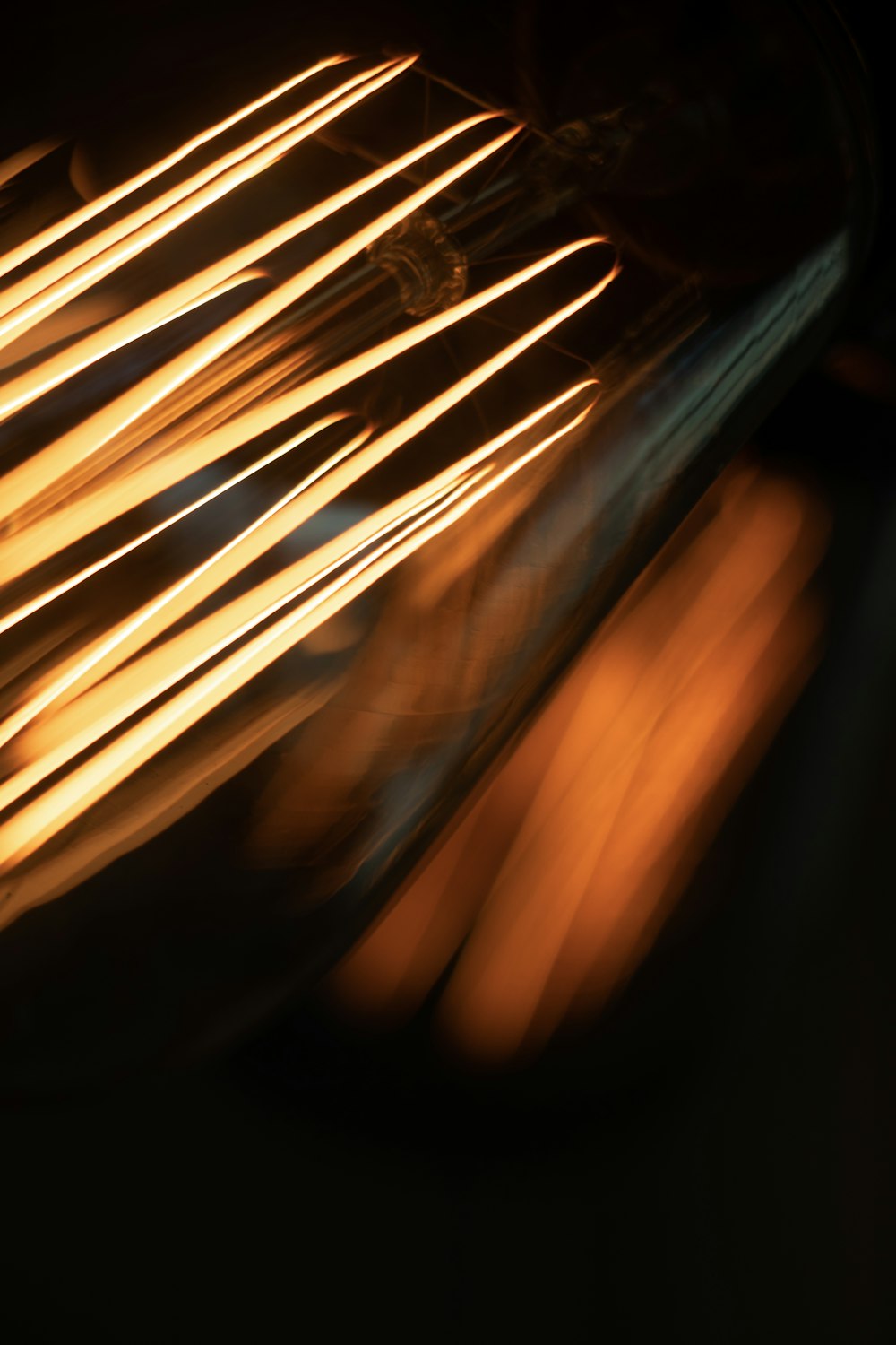 a close up of a toaster oven with light coming from it