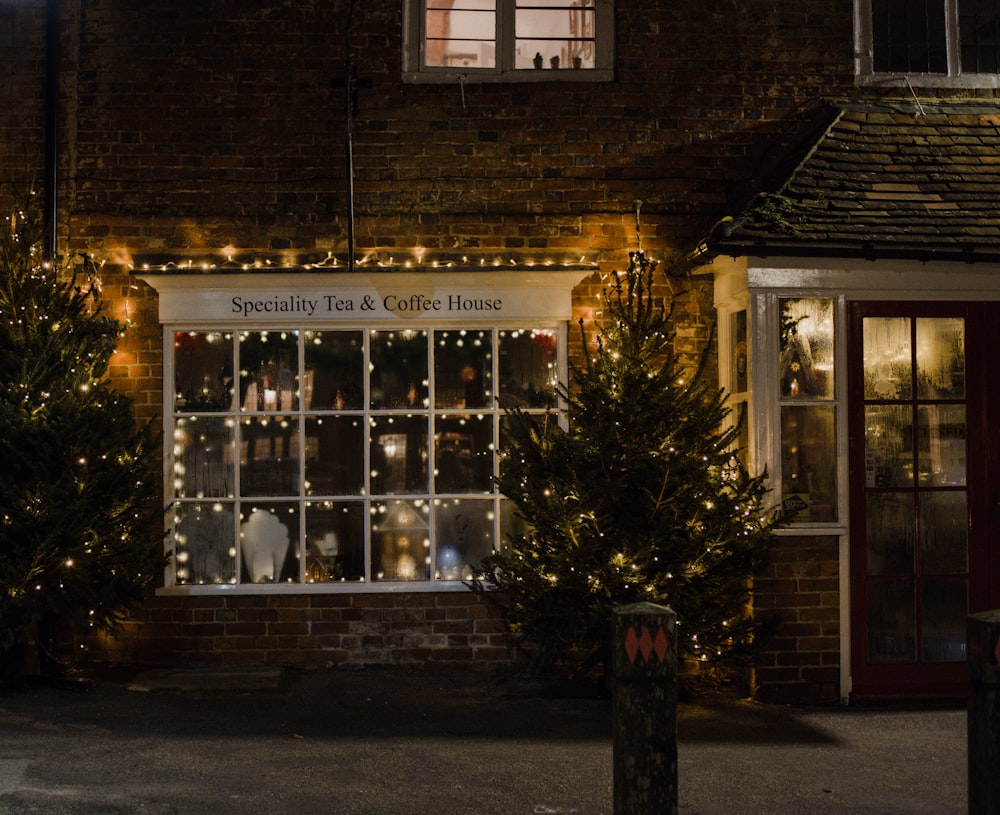 a building with christmas lights on the outside of it