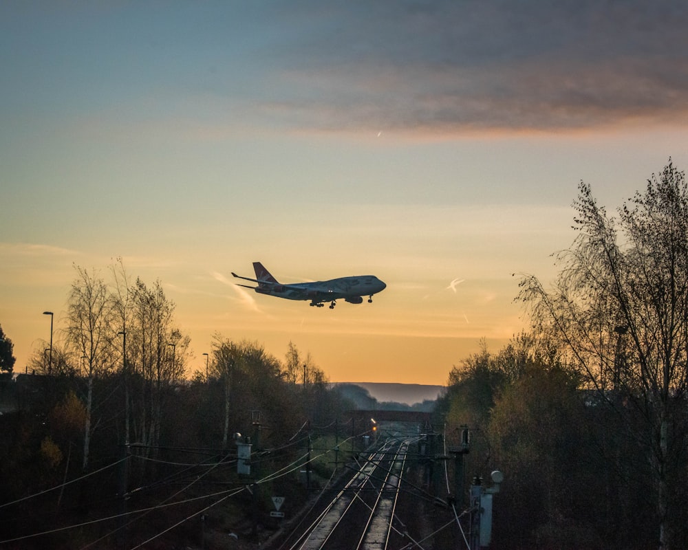 gray airplane midair scenery