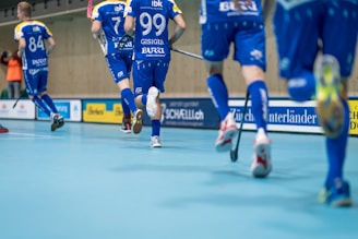 a group of men playing a game of soccer