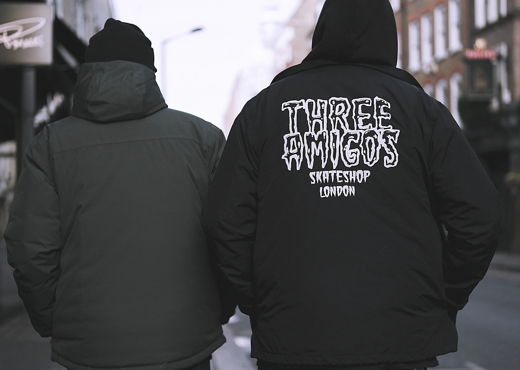 People wearing hoodies from behind, representing wearable conscious streetwear