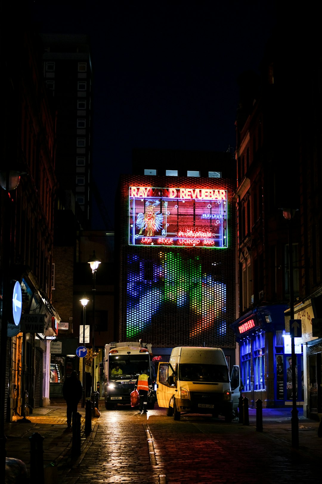 photography of traveling vehicle during nighttime