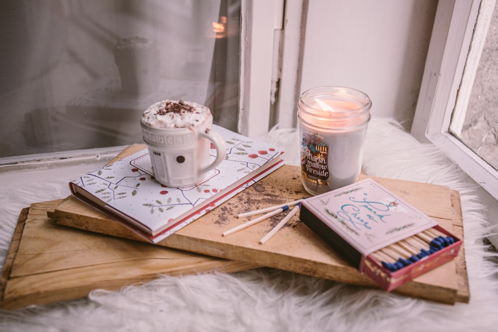 dessert mug on book