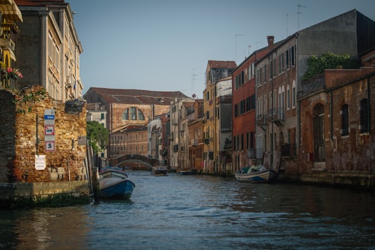 boats docked on the side of the houses in Basilica dei Santi Giovanni e Paolo Italy