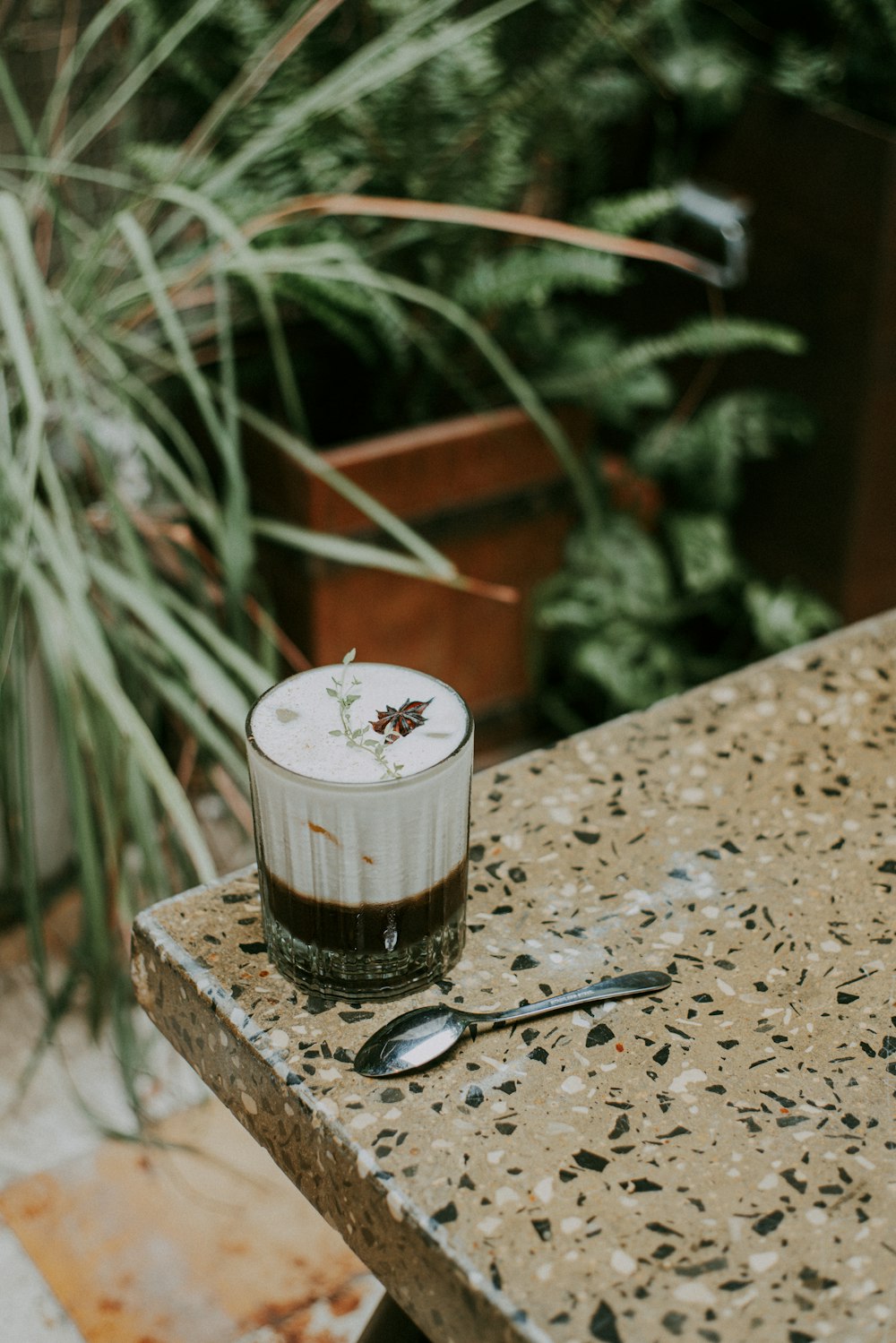 glass of frappe on edge of table