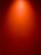 a red wall with a light on top of it