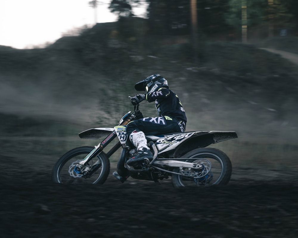 person riding motocross bike