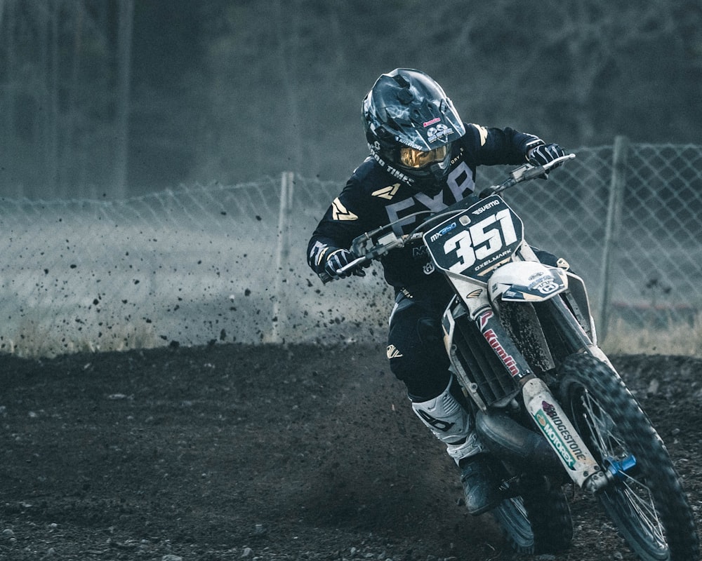 man riding motocross bike