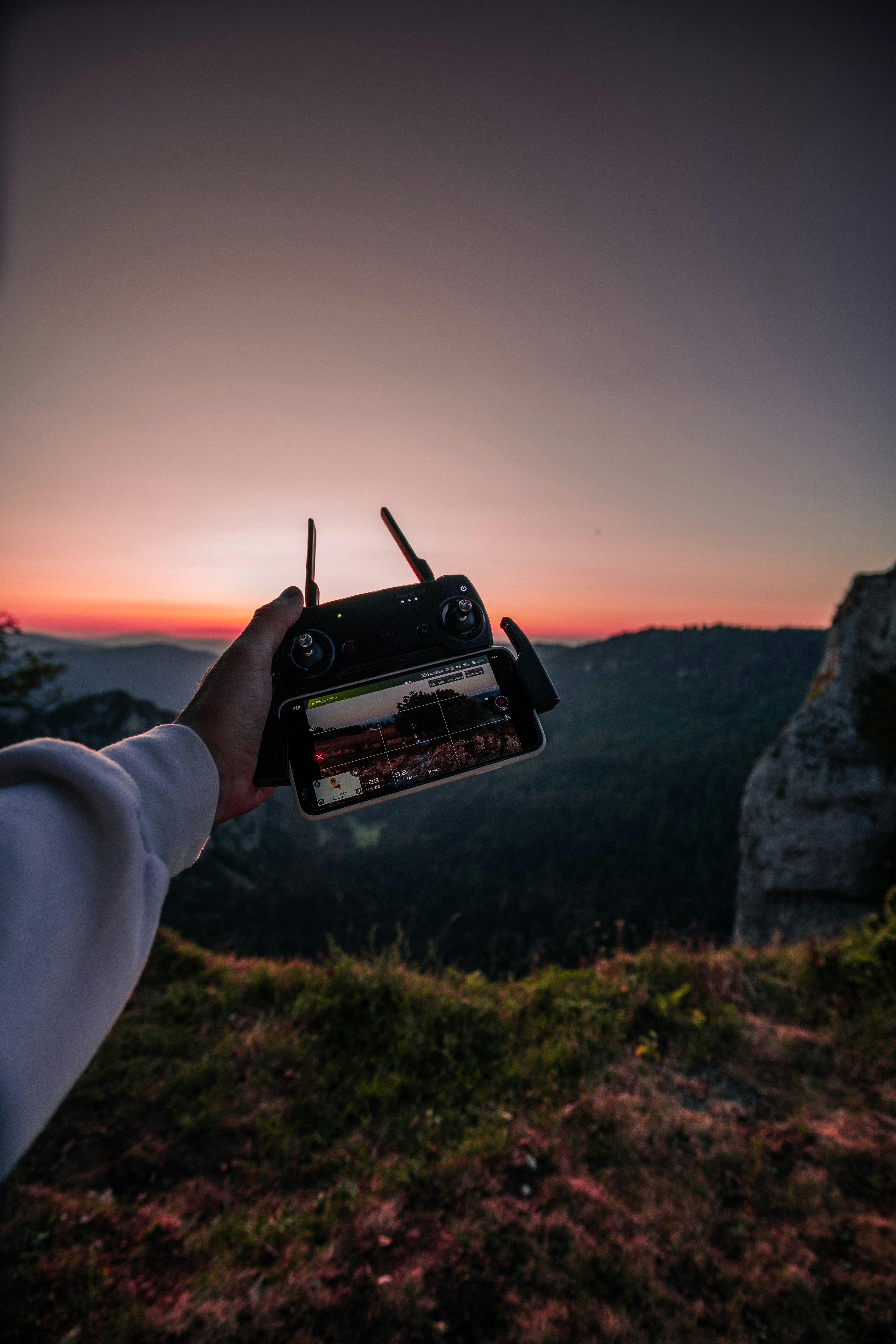 person holding digital controller