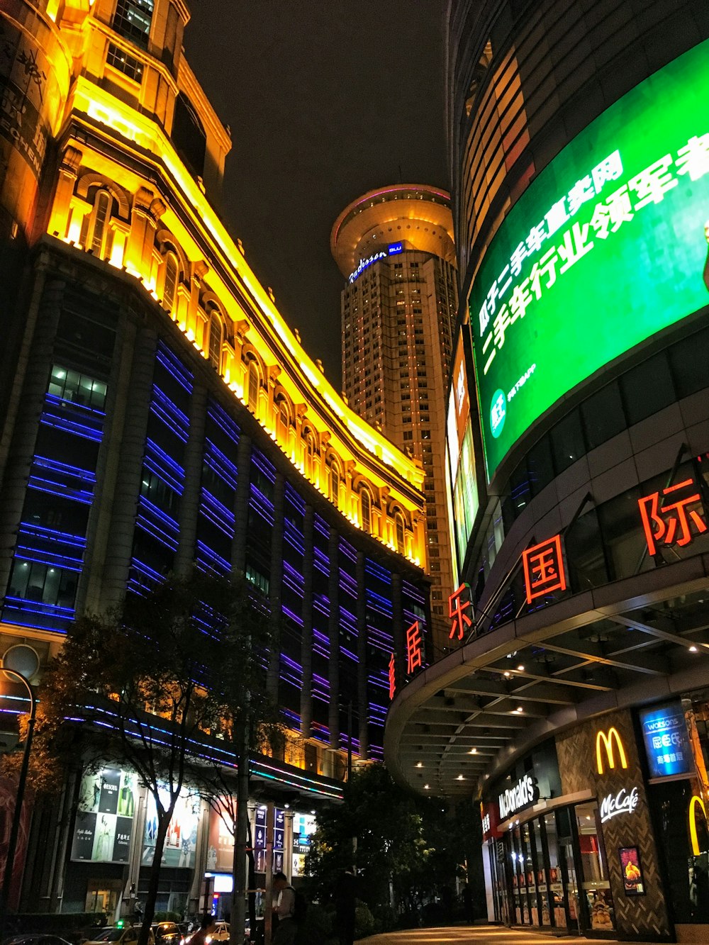 view photography of lighted buildings during nighttime