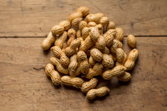 bunch of brown peanuts