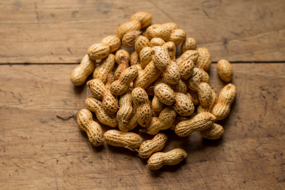 bunch of brown peanuts