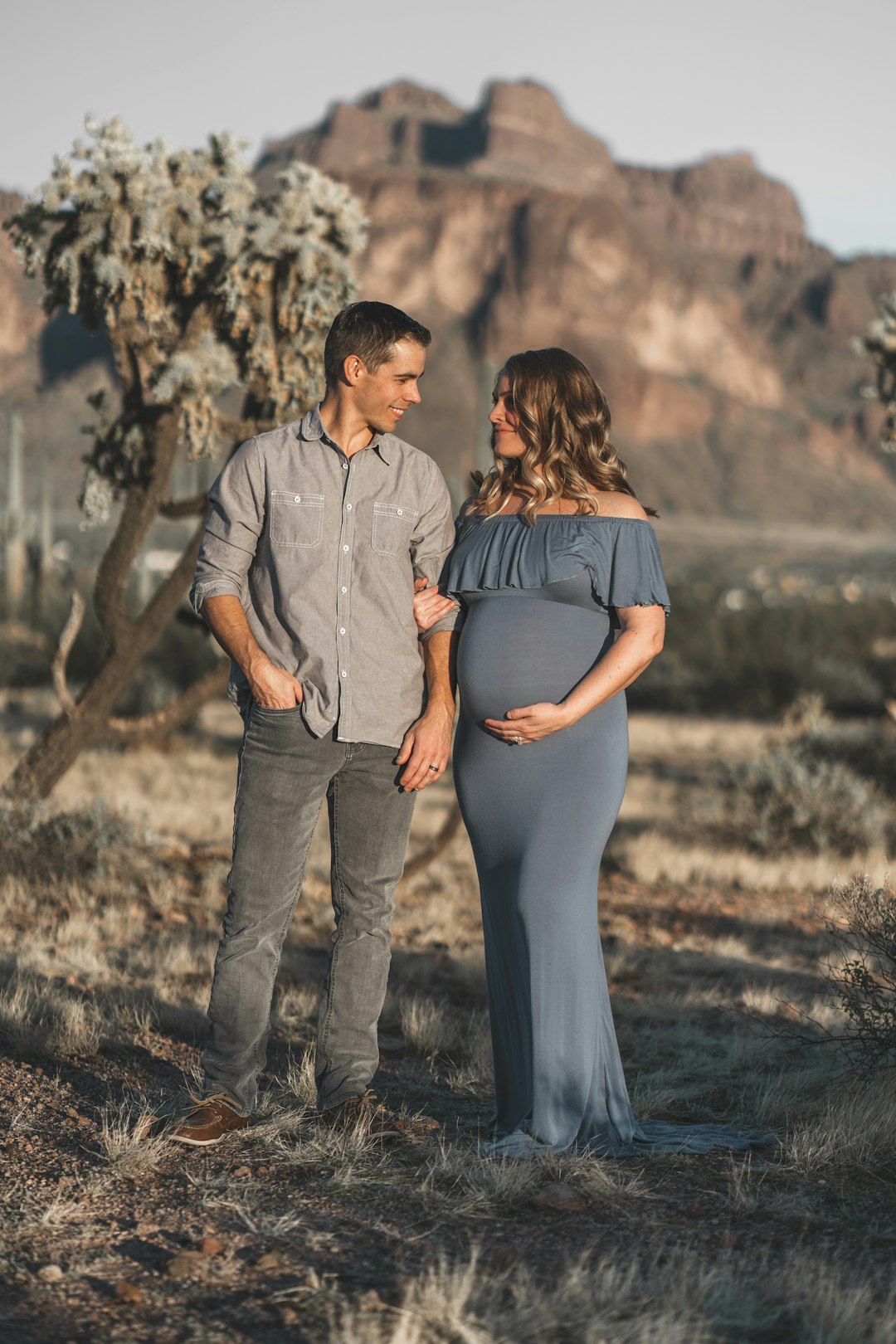 man and woman near tree