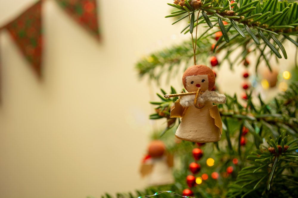 angel Christmas decor hanging on Christmas tree