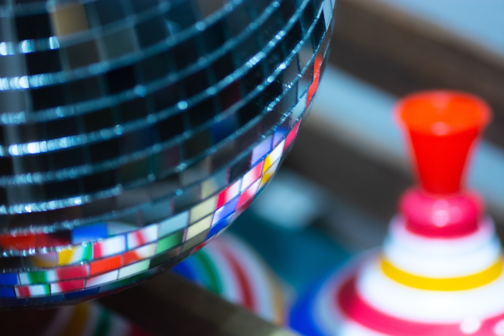 macro photography of multicolored disco ball