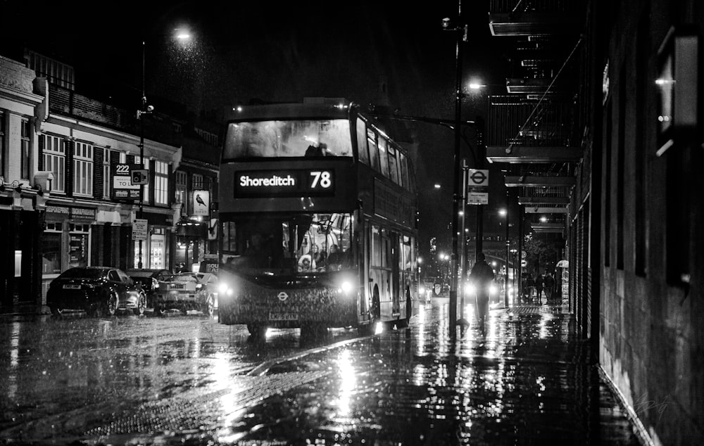 grayscale photo of double-decker bus