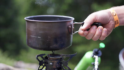 gray cooking pot and protable stove