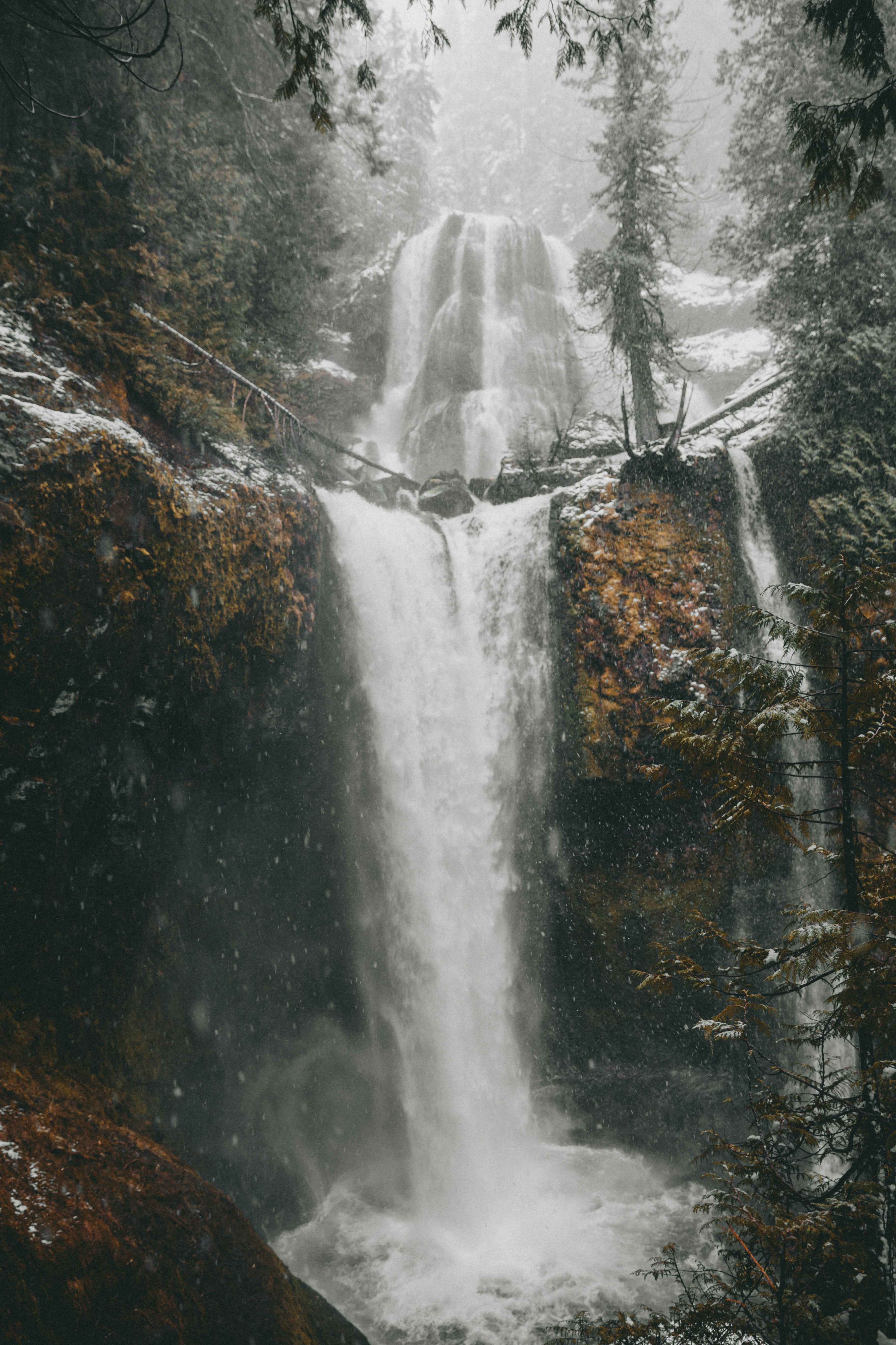 flowing waterfalls during daytime