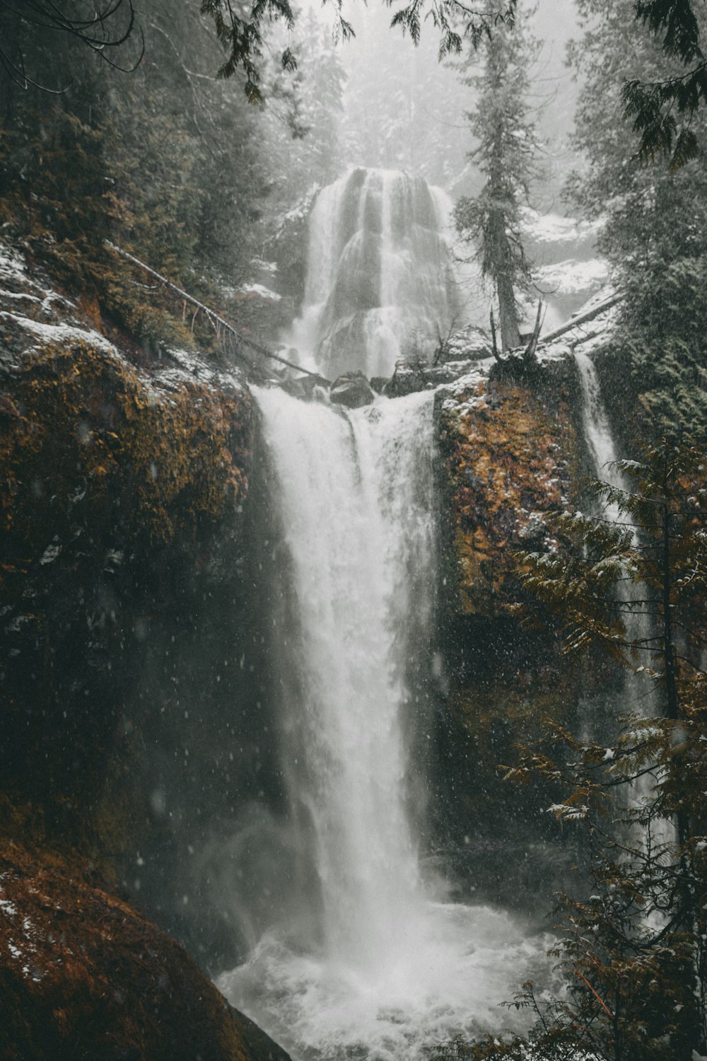 flowing waterfalls during daytime
