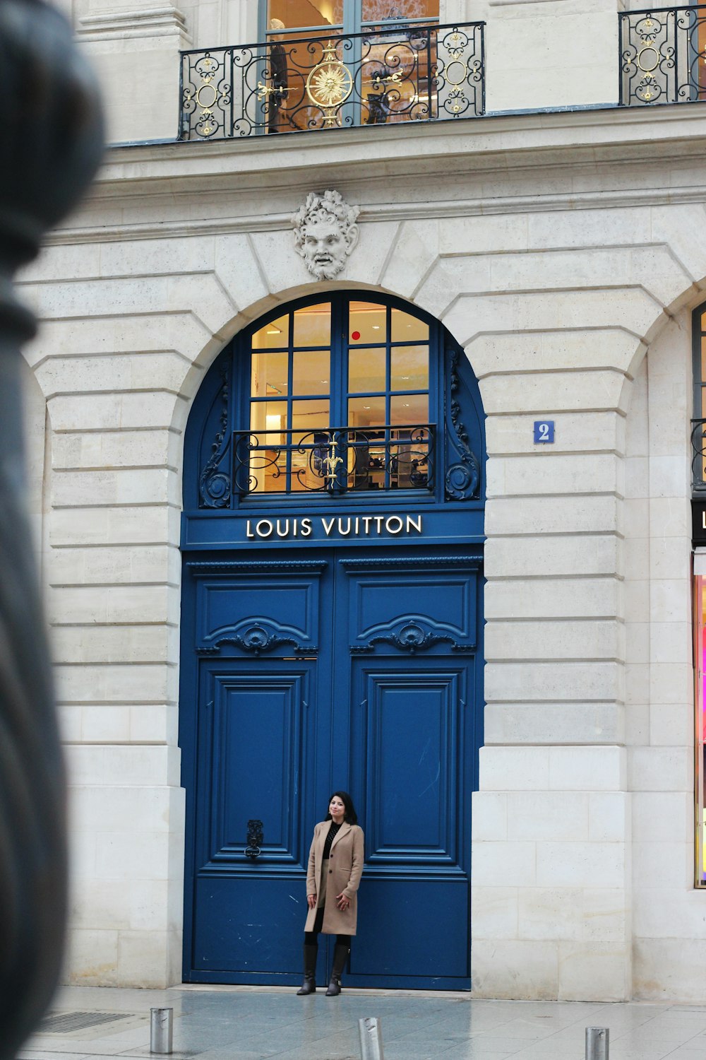 standing blue Louis Vuitton door photo – Free Blue Image on Unsplash