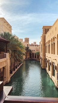 canal between concrete buildings