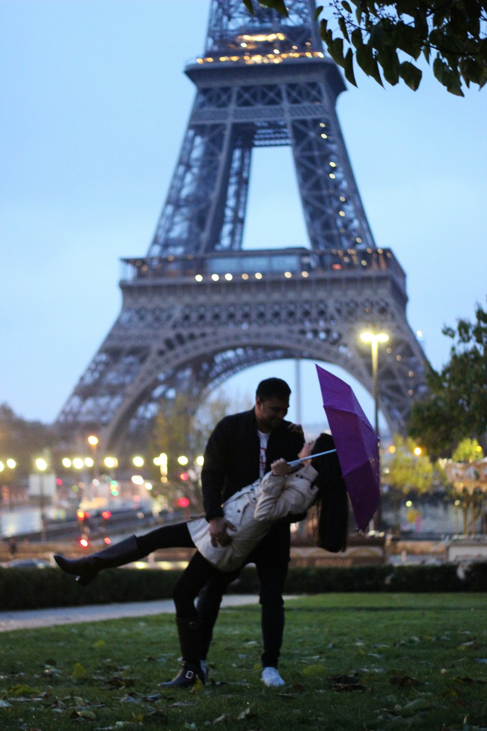 woman and man standing near Eiffel Tower