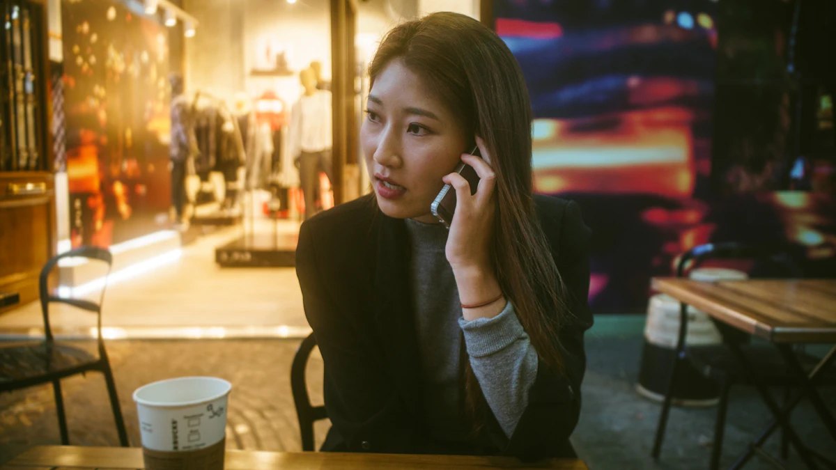 A woman talking on the phone while standing in front of her small business store