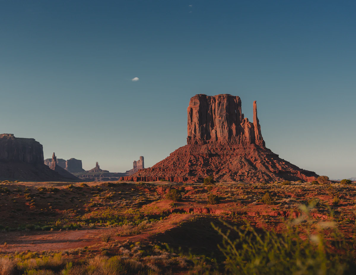 Red rock buttes glowing at dusk in the high desert