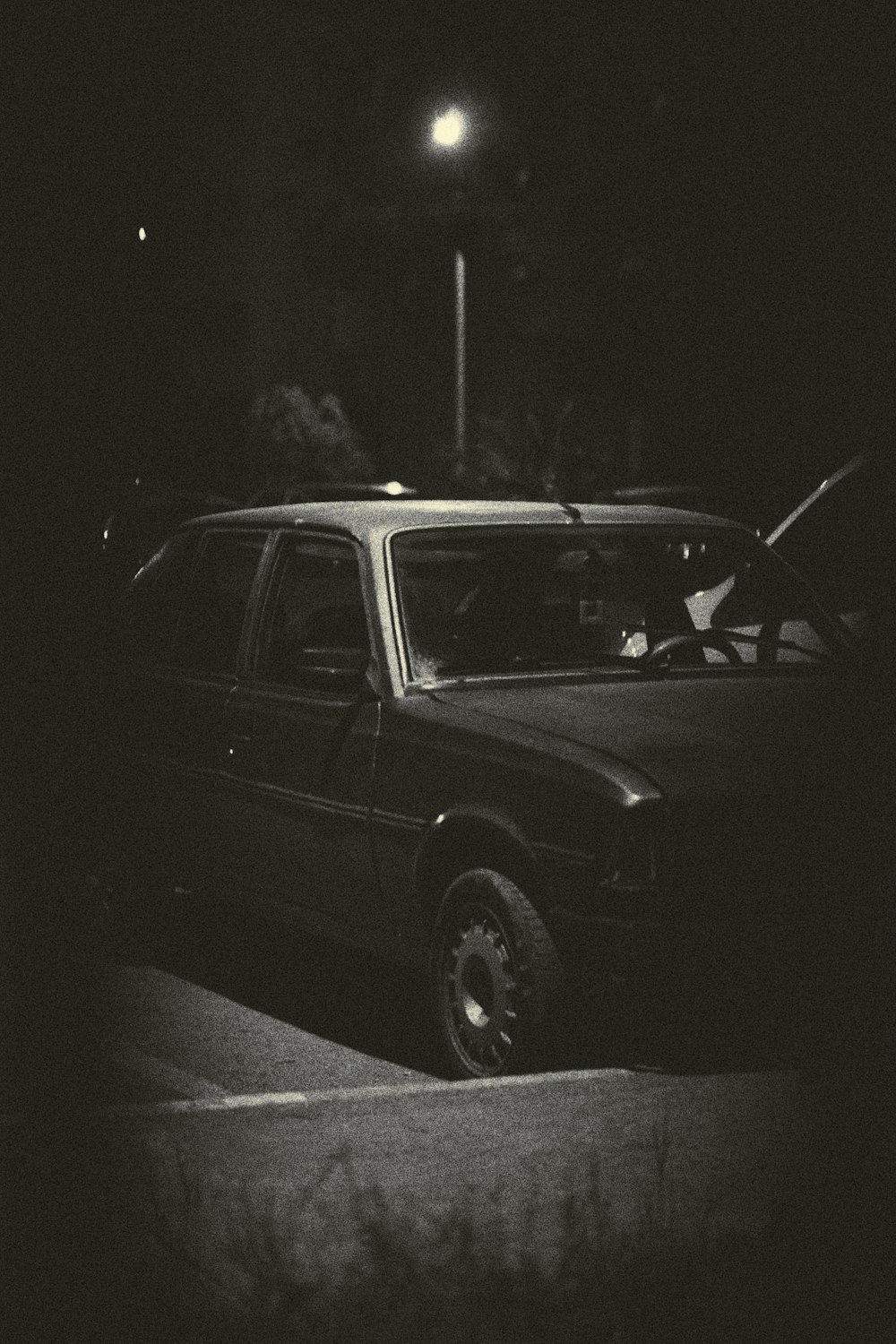 grayscale photo of sedan