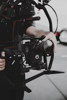 Portrait of me holding a camera rig, ready to capture the next story.