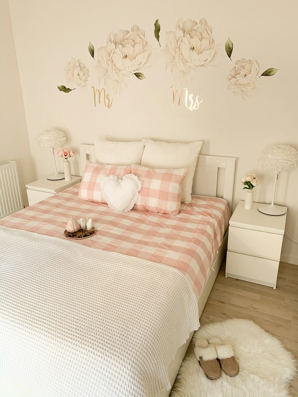 white and pink bed sheet