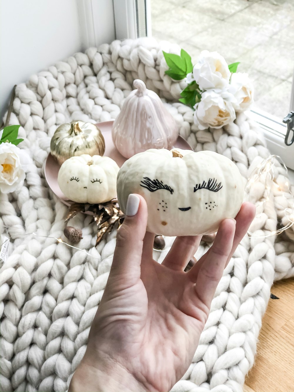 white pumpkin with face paint