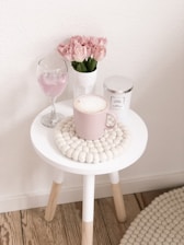pink mug on side table