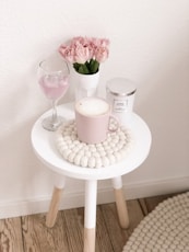 pink mug on side table