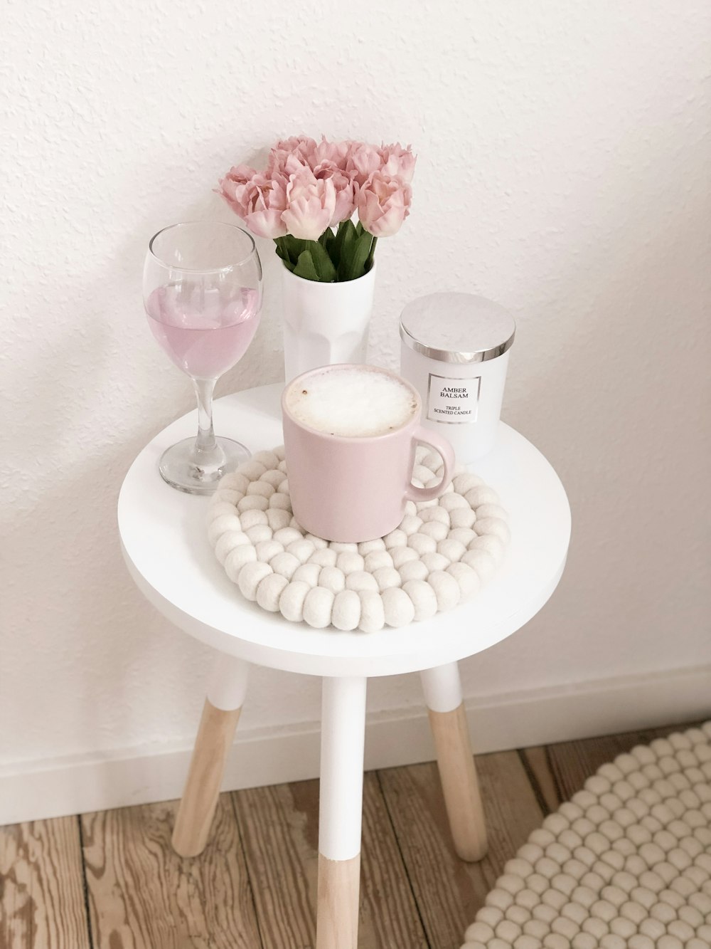 pink mug on side table