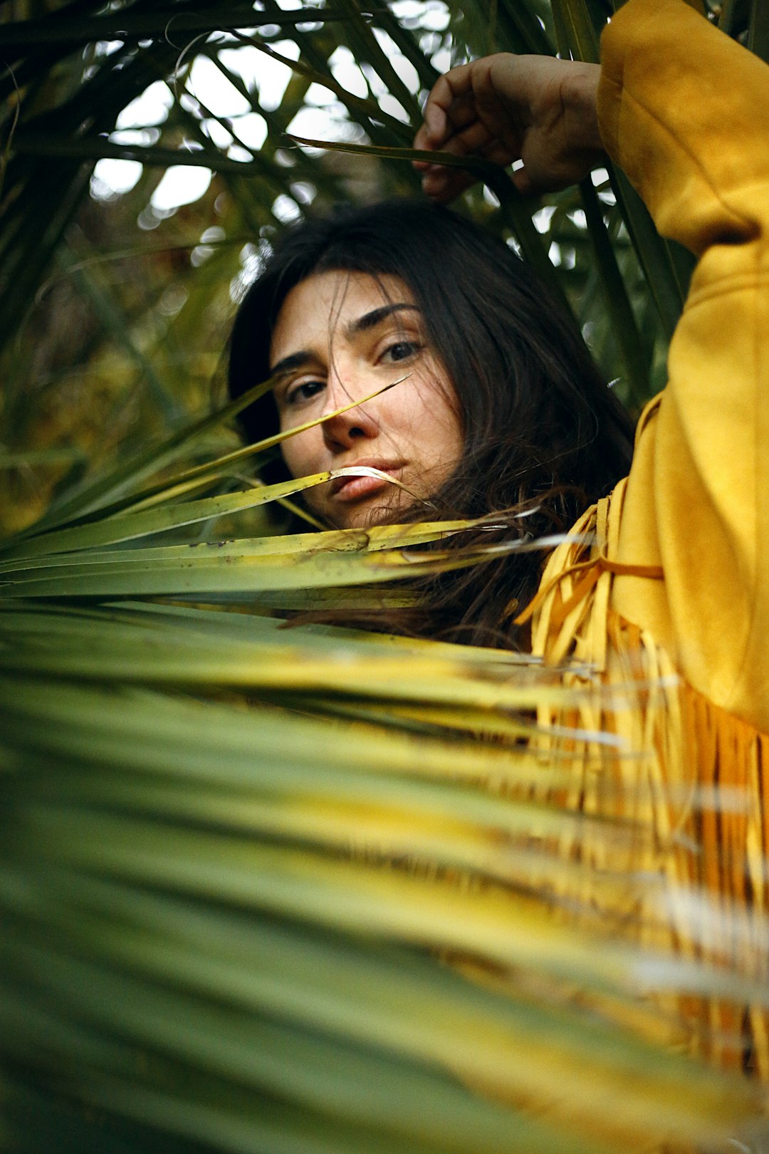 woman wearing yellow jacket