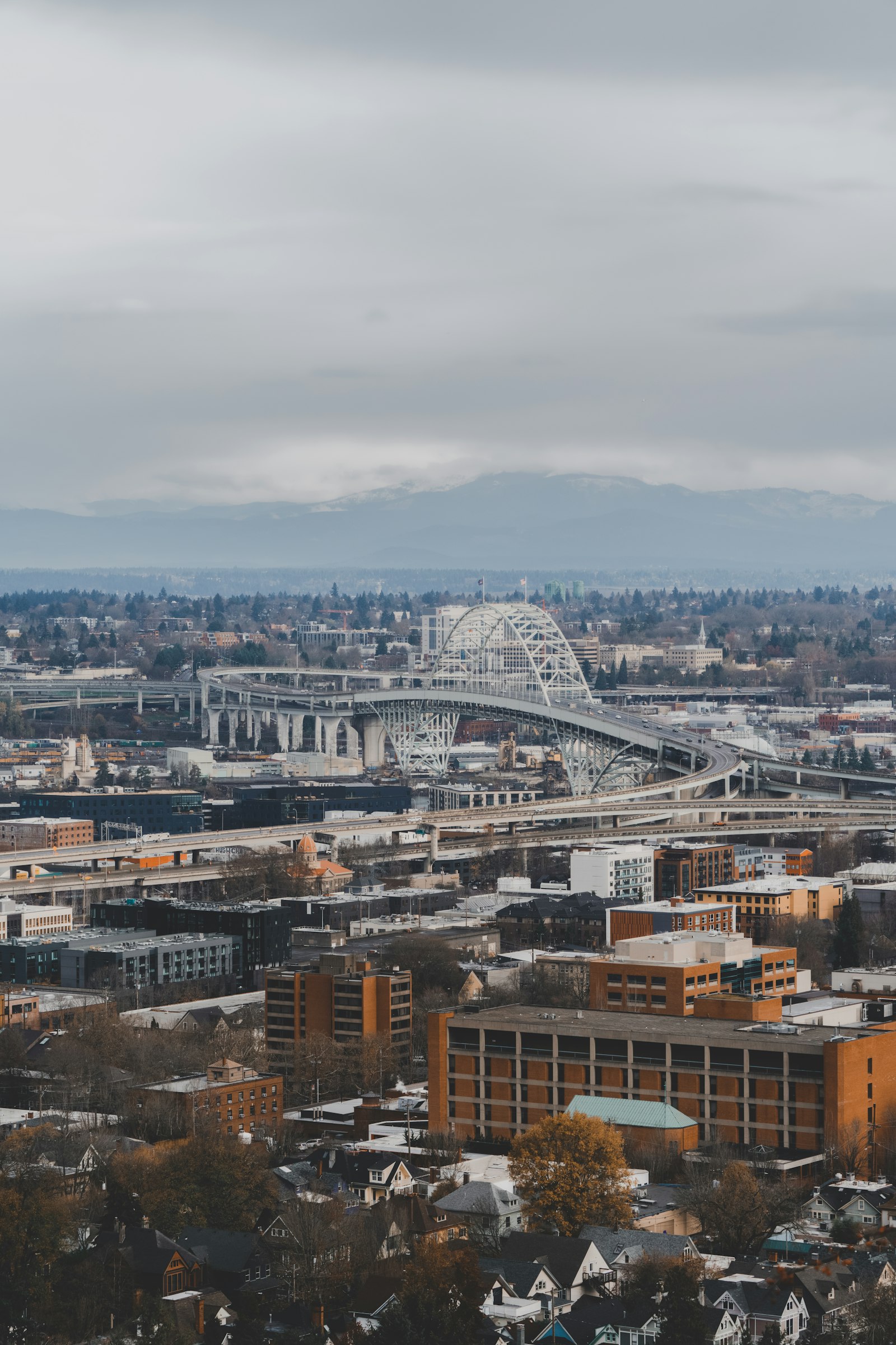 Sony a7R IV + Sony FE 100-400mm F4.5-5.6 GM OSS sample photo. Aerial photography of city photography